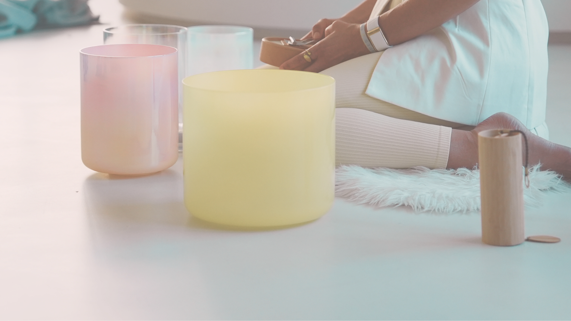 Crystal singing bowls in soft light
